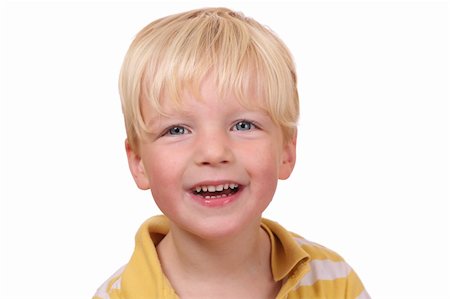 simsearch:400-05745952,k - Portrait of a laughing young boy on white background Stock Photo - Budget Royalty-Free & Subscription, Code: 400-05745946