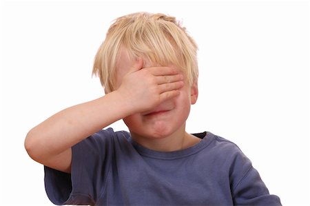 people in panic - Portrait of a frightened young boy covering his eyes Stock Photo - Budget Royalty-Free & Subscription, Code: 400-05745959