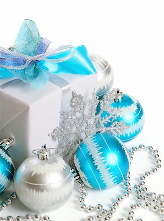 Gift box with Christmas decorations on white background Stock Photo - Budget Royalty-Free & Subscription, Code: 400-05746420
