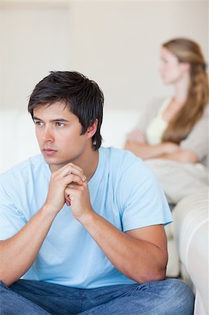 simsearch:400-08338944,k - Portrait of an upset couple after an argument in their living room Stock Photo - Budget Royalty-Free & Subscription, Code: 400-05746707