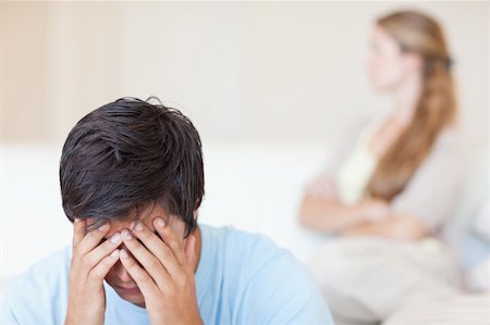 Upset couple after an argument in their living room Stock Photo - Budget Royalty-Free & Subscription, Code: 400-05746703