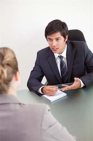Portrait of a manager interviewing a female applicant in his office Stock Photo - Budget Royalty-Free & Subscription, Code: 400-05746952