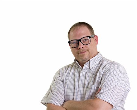 Smiling nerdy man with arms crossed over white Stock Photo - Budget Royalty-Free & Subscription, Code: 400-05747738