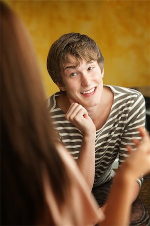 Happy Caucasian teen with woman chit-chat in kitchen Stock Photo - Budget Royalty-Free & Subscription, Code: 400-05747766