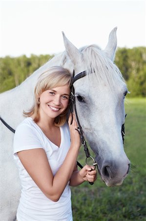 simsearch:400-05748585,k - An attractive young woman with a horse Foto de stock - Super Valor sin royalties y Suscripción, Código: 400-05748585