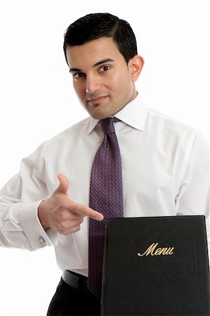 A smartly dressed waiter or restaurnt owner pointing to a menu.  Could also be a presentation, brochure or other business item. Photographie de stock - Aubaine LD & Abonnement, Code: 400-05748644