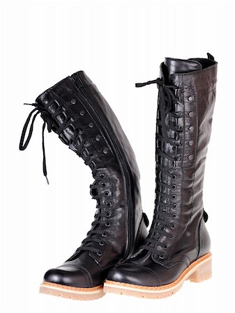 black female boots isolated on white background Fotografie stock - Microstock e Abbonamento, Codice: 400-05748905