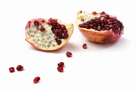 simsearch:400-05196174,k - piece of pomegranate isolated on the white Photographie de stock - Aubaine LD & Abonnement, Code: 400-05749060