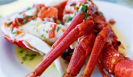 eating seafood restaurant - Delicious crayfish served with Garlic Butter marinade Photographie de stock - Aubaine LD & Abonnement, Code: 400-05749327