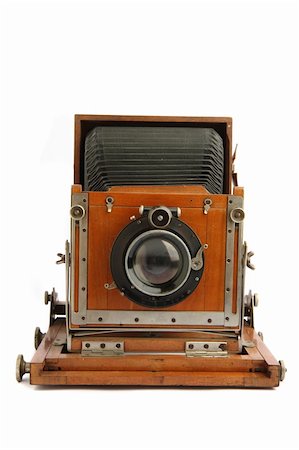 old wooden camera isolated on the white background Stock Photo - Budget Royalty-Free & Subscription, Code: 400-05749528