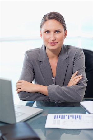 simsearch:400-04894274,k - Portrait of a serious businesswoman working in her office Stock Photo - Budget Royalty-Free & Subscription, Code: 400-05740215