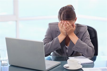 Frustrated businesswoman crying in her office Stock Photo - Budget Royalty-Free & Subscription, Code: 400-05740239