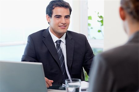 simsearch:400-04187120,k - Young manager interviewing a female applicant in his office Stock Photo - Budget Royalty-Free & Subscription, Code: 400-05740314