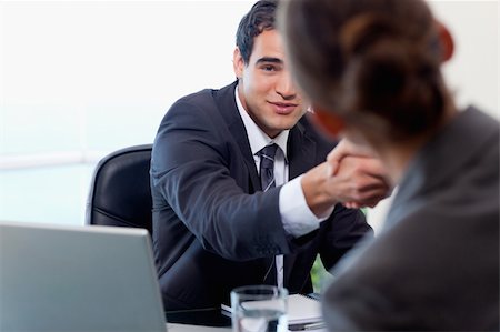 simsearch:400-03915088,k - Satisfied manager interviewing a female applicant in his office Stock Photo - Budget Royalty-Free & Subscription, Code: 400-05740317