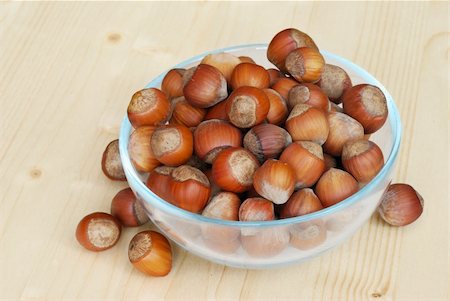 simsearch:400-06520688,k - Hazelnuts on a wooden table Stock Photo - Budget Royalty-Free & Subscription, Code: 400-05741468