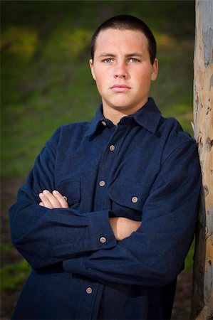 Handsome Young Blue Eyed Boy Portrait Outside Stock Photo - Budget Royalty-Free & Subscription, Code: 400-05741746