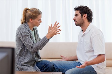 simsearch:400-05739935,k - Woman being mad at her boyfriend in their living room Stock Photo - Budget Royalty-Free & Subscription, Code: 400-05741771