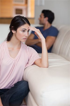 simsearch:400-05739935,k - Portrait of a young couple after an argument in their living room Stock Photo - Budget Royalty-Free & Subscription, Code: 400-05742055