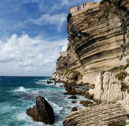 Wild and beautiful coast of Corsica with spectacular stone formations in the sea Fotografie stock - Microstock e Abbonamento, Codice: 400-05742235