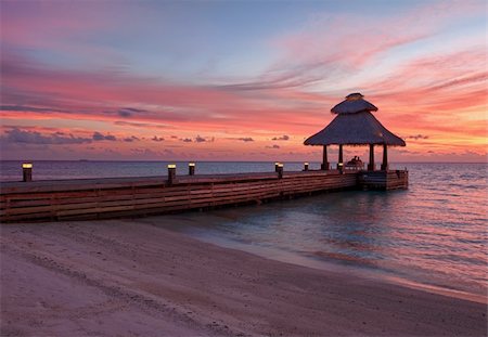 Awsome vivid sunset over the jetty in the Indian ocean, Maldives. HDR Stock Photo - Budget Royalty-Free & Subscription, Code: 400-05742450