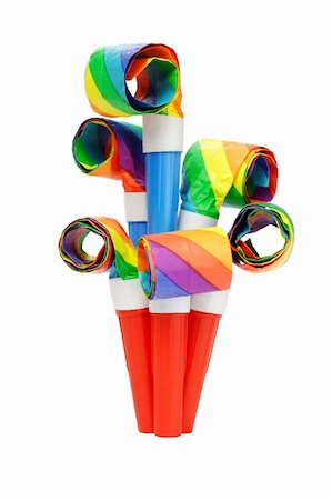 Colorful party blowers arranged on white background Stock Photo - Budget Royalty-Free & Subscription, Code: 400-05742674