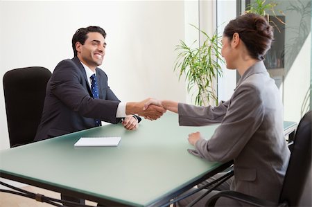 simsearch:400-05022667,k - Smiling manager interviewing a good looking applicant in his office Stockbilder - Microstock & Abonnement, Bildnummer: 400-05742777