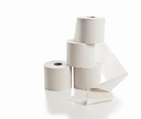 Rolls of toilet paper arranged on white background Fotografie stock - Microstock e Abbonamento, Codice: 400-05742855