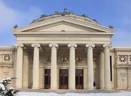 Image during the winter of The Romanian Athenaeum in Bucharest, an important concert hall and a landmark for the city. The building is also home of the George Enescu Philharmonic and the host of the annual George Enescu international music festival. Photographie de stock - Aubaine LD & Abonnement, Code: 400-05743225