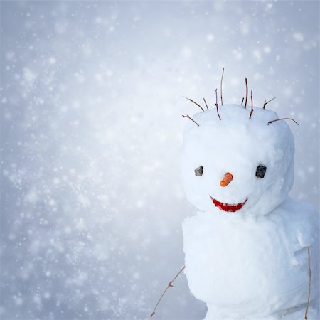 simsearch:400-05681859,k - Funny Snowman with carot and sticks under snowy background Stock Photo - Budget Royalty-Free & Subscription, Code: 400-05743435