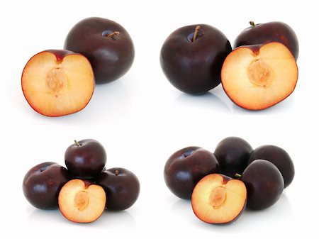 simsearch:400-04859130,k - Plums isolated on white background Photographie de stock - Aubaine LD & Abonnement, Code: 400-05754451