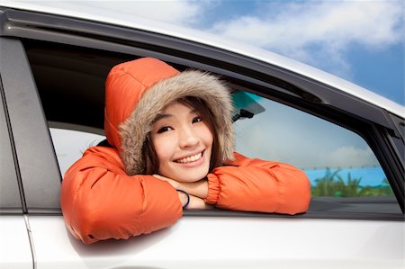 simsearch:400-05348542,k - young woman in a car with winter wear Photographie de stock - Aubaine LD & Abonnement, Code: 400-05755187