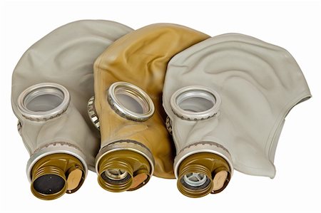 three old military gas mask isolated on white Stock Photo - Budget Royalty-Free & Subscription, Code: 400-05755350