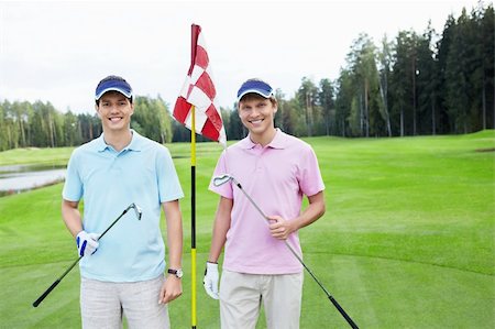 simsearch:400-05748592,k - Two men on golf course Stock Photo - Budget Royalty-Free & Subscription, Code: 400-05755696