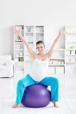 A pregnant young woman is doing on fitball Stock Photo - Budget Royalty-Free & Subscription, Code: 400-05755709