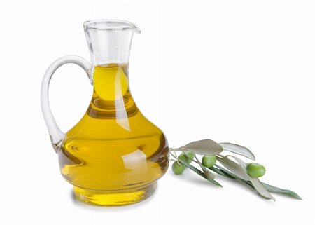 simsearch:400-04598775,k - Bottle of olive oil and fresh olive branch with olives isolated on white background Photographie de stock - Aubaine LD & Abonnement, Code: 400-05756073