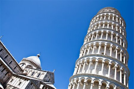roman towers - Italy - Pisa. The famous leaning tower on a perfect blue bakcground Stock Photo - Budget Royalty-Free & Subscription, Code: 400-05750328