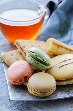 traditional french macarons with tea set on the background Stock Photo - Budget Royalty-Free & Subscription, Code: 400-05751124