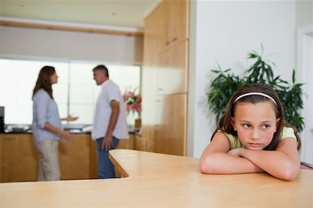 divorced family - Sad girl listening to her fighting parents Stock Photo - Budget Royalty-Free & Subscription, Code: 400-05751690