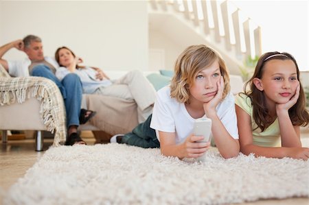 simsearch:400-05897773,k - Siblings are bored by tv program Stock Photo - Budget Royalty-Free & Subscription, Code: 400-05751860