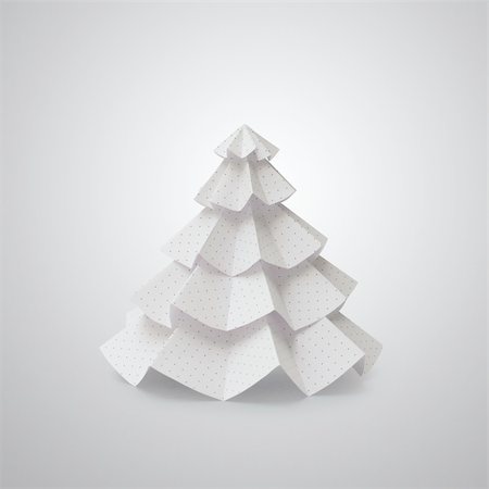 simsearch:400-05715740,k - Handmade Christmas tree cut out from office paper with small dots (file with cliiping path) Photographie de stock - Aubaine LD & Abonnement, Code: 400-05752629