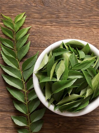 close up of fresh indian curry leaves Stock Photo - Budget Royalty-Free & Subscription, Code: 400-05752638