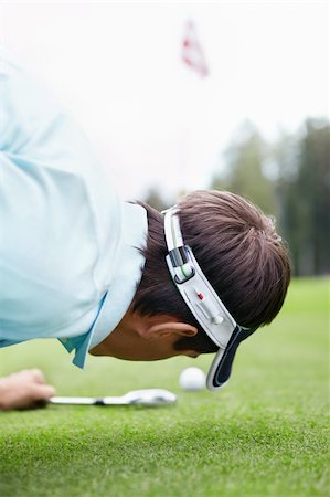 simsearch:400-05748591,k - A young man playing golf Stock Photo - Budget Royalty-Free & Subscription, Code: 400-05753071