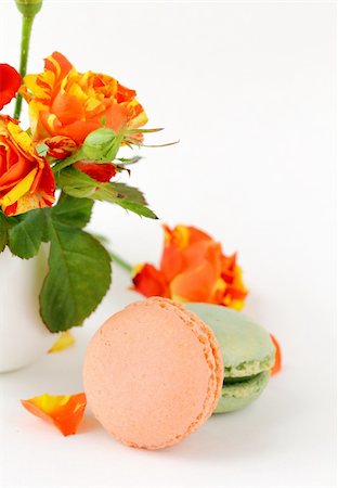 traditional french macarons with roses on the background Stock Photo - Budget Royalty-Free & Subscription, Code: 400-05753265