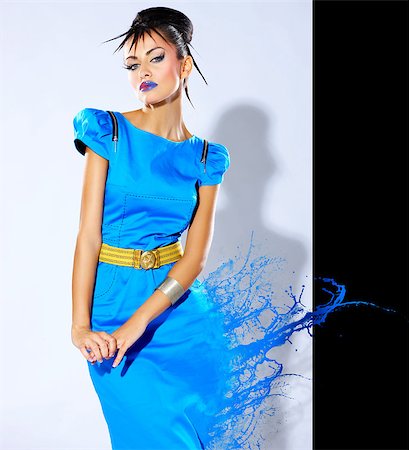 Beautiful female fashion model with paint splash Stock Photo - Budget Royalty-Free & Subscription, Code: 400-05875385