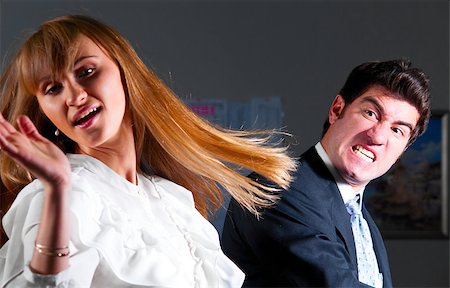 angry businessman is slapping across the businesswoman's face Foto de stock - Super Valor sin royalties y Suscripción, Código: 400-05875475