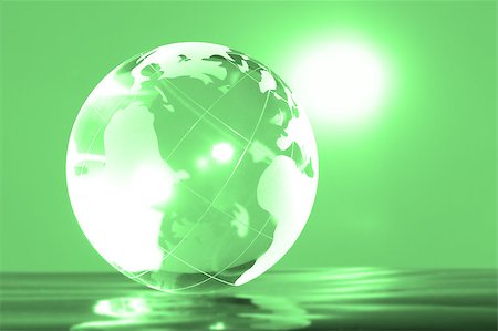 Glass globe with bright highlights on a green background Stockbilder - Microstock & Abonnement, Bildnummer: 400-05875574