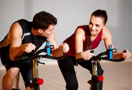 Sporty couple exercising at the fitness gym Stock Photo - Budget Royalty-Free & Subscription, Code: 400-05875719