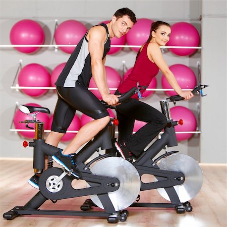Sporty couple exercising at the fitness gym Stock Photo - Budget Royalty-Free & Subscription, Code: 400-05875724