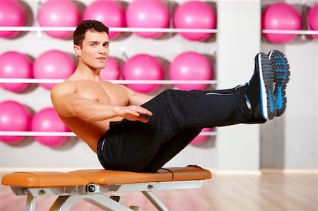 simsearch:400-05273035,k - Handsome man at the gym doing exercises Stock Photo - Budget Royalty-Free & Subscription, Code: 400-05875766