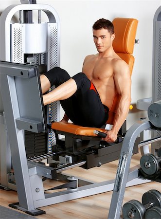simsearch:400-05910572,k - Handsome man at the gym doing exercises Fotografie stock - Microstock e Abbonamento, Codice: 400-05875801